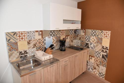 Kuchyň nebo kuchyňský kout v ubytování Central Apartments Circolo