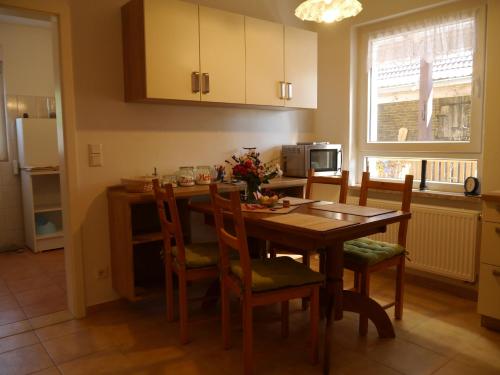 Kuchyň nebo kuchyňský kout v ubytování Ferienhaus-Uckermarkblick