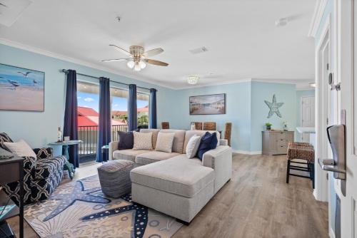 a living room with a couch and a chair at Sunset Harbor Unit 422 in Navarre