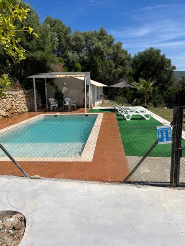 a swimming pool in a house with at Mirador de Mulera in Ubrique