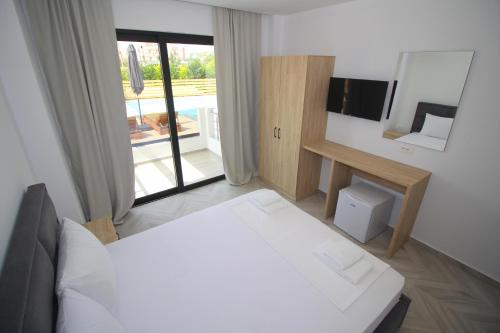 Postel nebo postele na pokoji v ubytování Noa Boutique Hotel