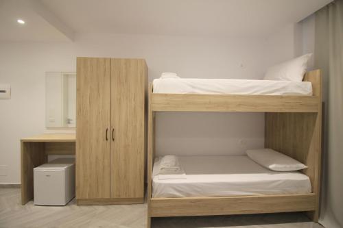 Postel nebo postele na pokoji v ubytování Noa Boutique Hotel