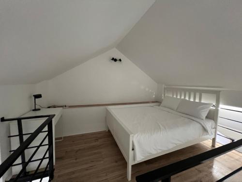 Postel nebo postele na pokoji v ubytování Apartment Magnolia gallery