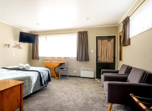Te Anau Lakeview Holiday Park & Motelsにあるベッド
