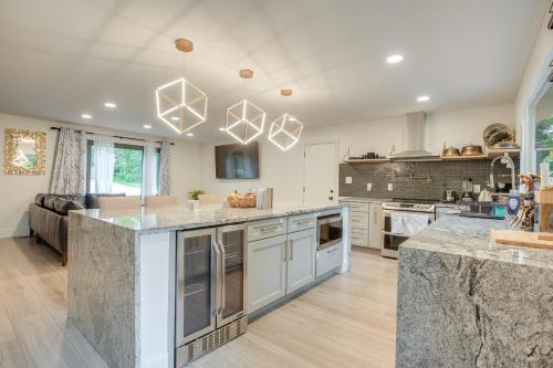 a large kitchen with a large island in a room at Spacious Riverfront Delaware Home with Views in Delaware