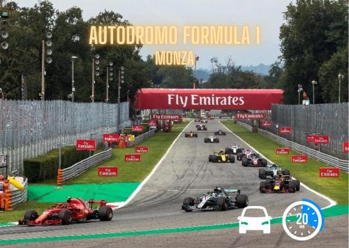 a group of race cars on a race track at LA CASA DI AMBRA in Limbiate