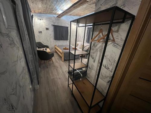 an overhead view of a room with a mirror at Tinyhouse Kaňk - Kutná Hora in Kutná Hora