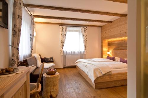 Ένα ή περισσότερα κρεβάτια σε δωμάτιο στο Sule Hof Agriturismo