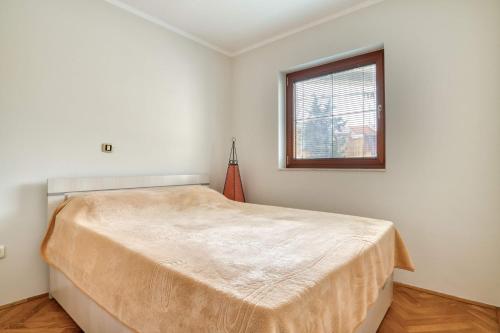 Llit o llits en una habitació de M Apartment Budva