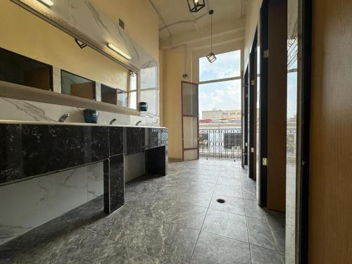 Kuchyň nebo kuchyňský kout v ubytování Rooms Zocalo