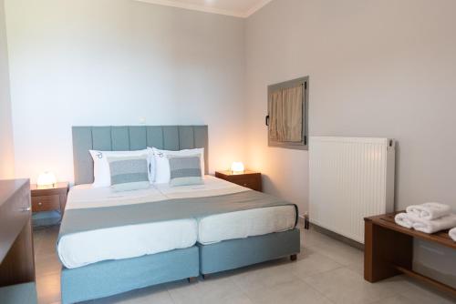 Ένα ή περισσότερα κρεβάτια σε δωμάτιο στο Dalasvillas SkalaMare