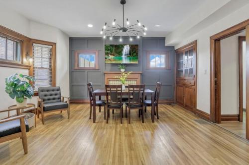 a dining room with a table and chairs at Updated 4BD House Near German Village w Parking in Columbus