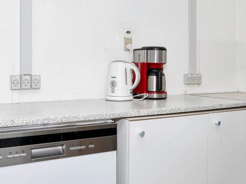 a coffeemaker sitting on a counter in a kitchen at 12 person holiday home in Roslev-By Traum in Roslev