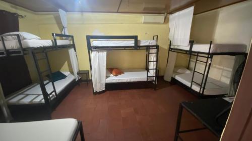 Postel nebo postele na pokoji v ubytování Hostel Pura Vida en Liberia