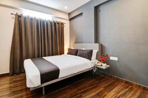 Postel nebo postele na pokoji v ubytování Super Townhouse XOTEL