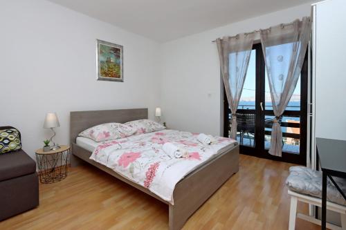 Apartments by the sea Senj - 22576