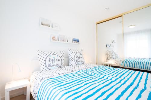 En eller flere senge i et værelse på Carpe Diem App 115