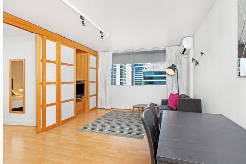 Телевизор и/или развлекательный центр в Ridge Apartment Hotel