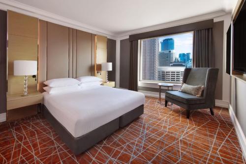 Ένα ή περισσότερα κρεβάτια σε δωμάτιο στο Brisbane Marriott Hotel