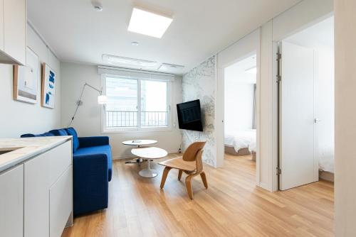 TV a/nebo společenská místnost v ubytování Gudo Residence Chungmuro