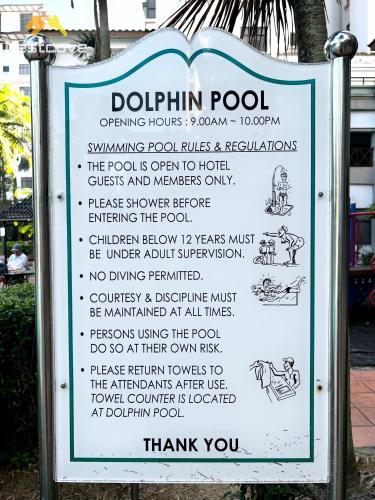 a sign for a doughnutpod restaurant with a menu at Costa Mahkota Suites Malacca Central By Nestcove in Melaka