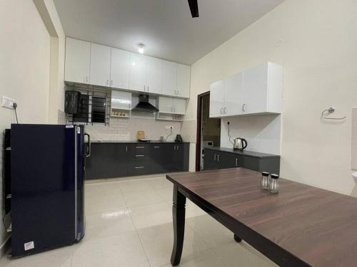 Kuchyň nebo kuchyňský kout v ubytování SSN Home Stays in Bangalore near PLAY Arena