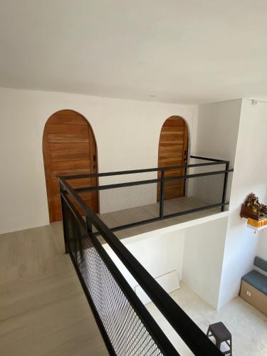 a staircase in a house with two bunk beds at WIJA's Bali Homestay in Legian