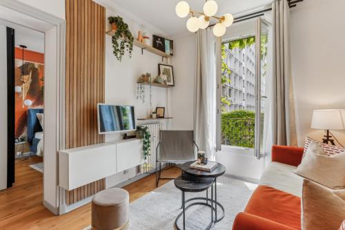 Posezení v ubytování Appartement Cosy à 2 pas de Paris