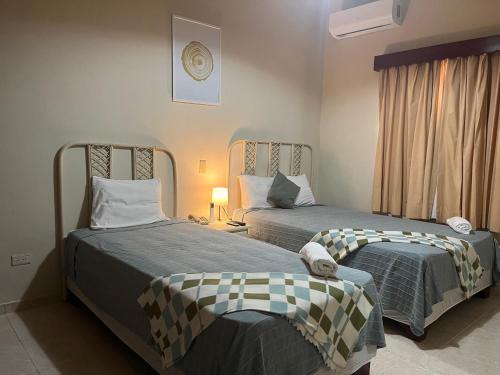 Katil atau katil-katil dalam bilik di Hotel Plaza Kavia