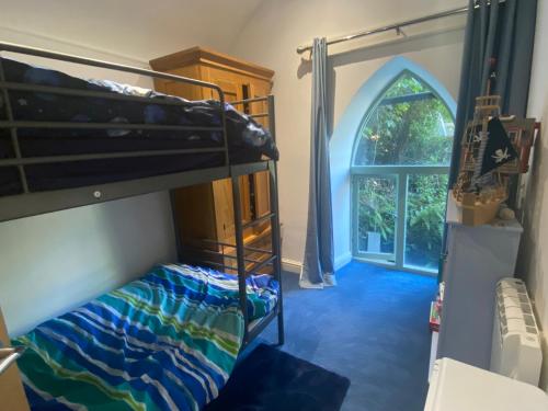 Ένα ή περισσότερα κρεβάτια σε δωμάτιο στο The chapel