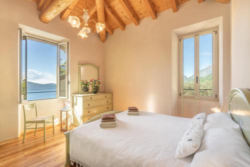 Postel nebo postele na pokoji v ubytování Piccola Meraviglia Sul Garda
