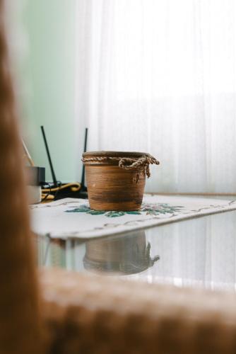 a basket sitting on top of a table at Riverside • cabine in Gălăuţaş