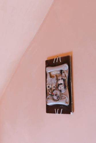 a cell phone in a brown box on a plate at Riverside • cabine in Gălăuţaş