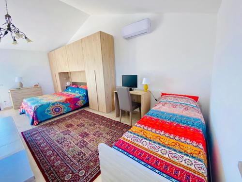 Postel nebo postele na pokoji v ubytování Way2Rome Apartments