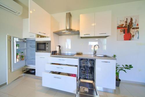 Dapur atau dapur kecil di Apartment SARA
