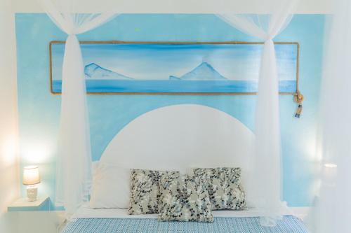 Holiday Eolie Villageにあるベッド