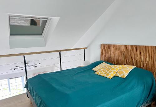 Katil atau katil-katil dalam bilik di La Rivière Appartement proche mer et centre de Wimereux