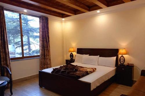 Giường trong phòng chung tại Edge Luxury Resorts