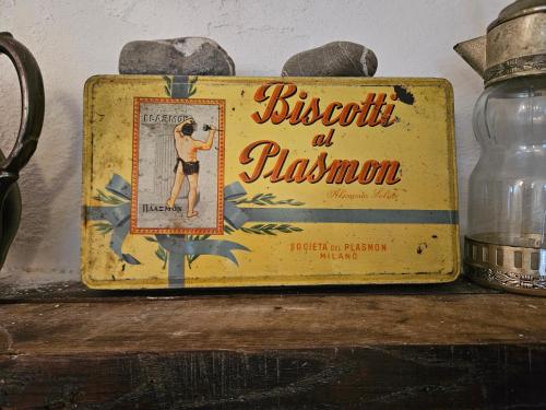 a sign sitting on top of a table at CASA LEONE BADALUCCO in Badalucco