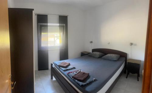 Posteľ alebo postele v izbe v ubytovaní Apartments Nicole Wera
