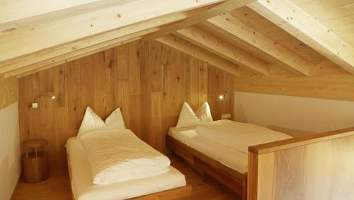 Ένα ή περισσότερα κρεβάτια σε δωμάτιο στο Hotel Stoeres - Active wellbeing