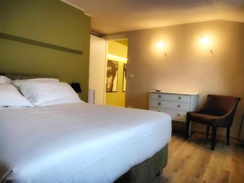 Postel nebo postele na pokoji v ubytování Bed&Breakfast Villa Devoto" La Torretta"