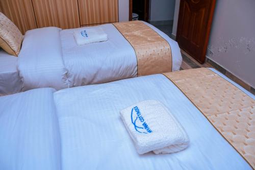 Кровать или кровати в номере Havana Cottages - Hyrax Hill