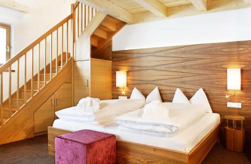 Ένα ή περισσότερα κρεβάτια σε δωμάτιο στο Hotel Stoeres - Active wellbeing