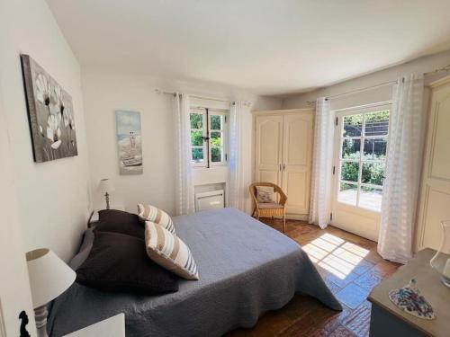 En eller flere senge i et værelse på Villa provençale, piscine