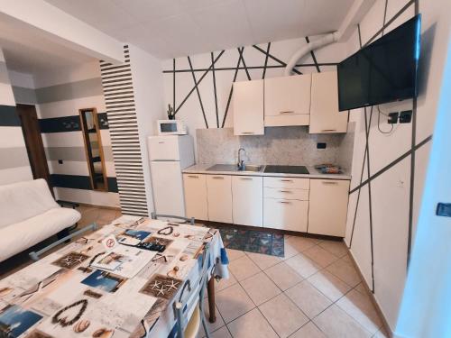 A kitchen or kitchenette at Residence Corallo