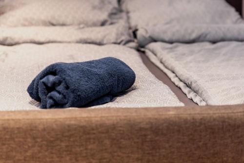 Ένα ή περισσότερα κρεβάτια σε δωμάτιο στο Pannon Apartment