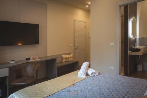 Televisyen dan/atau pusat hiburan di LivornoLuxuryStay