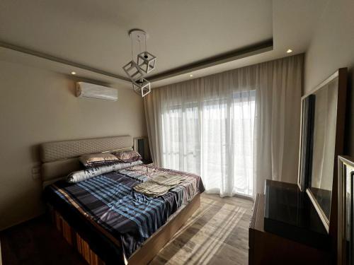 Postel nebo postele na pokoji v ubytování Mountain view Ras Elhekma Twin house challet 5 Bedrooms
