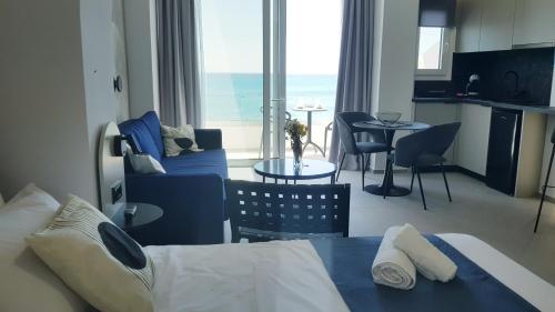 Postel nebo postele na pokoji v ubytování Seaside suite